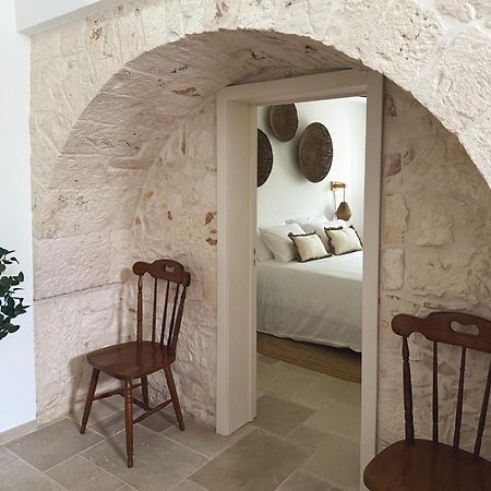 Trullo Pinto Apartment โลโกโรตอนโด ภายนอก รูปภาพ