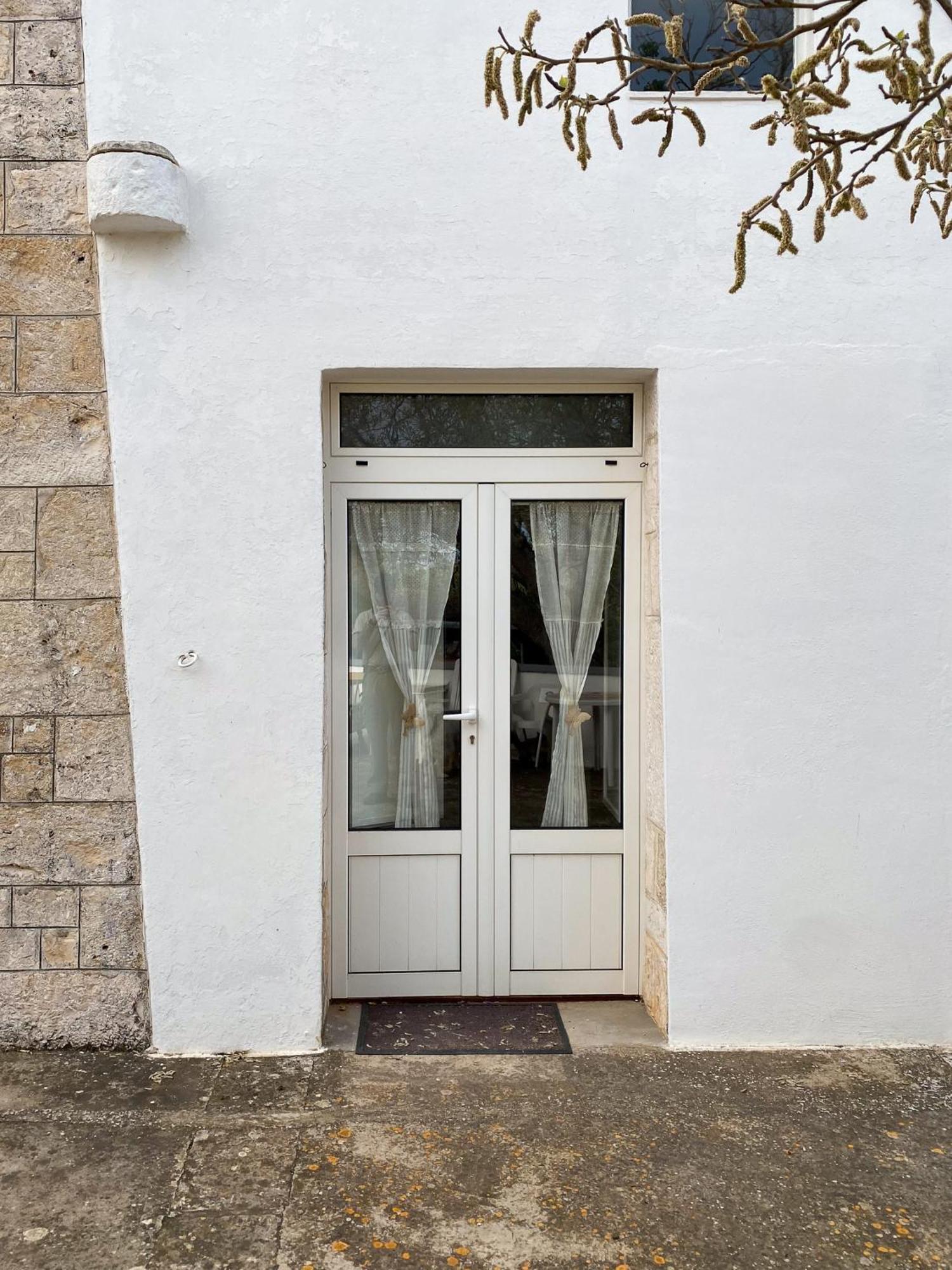Trullo Pinto Apartment โลโกโรตอนโด ภายนอก รูปภาพ