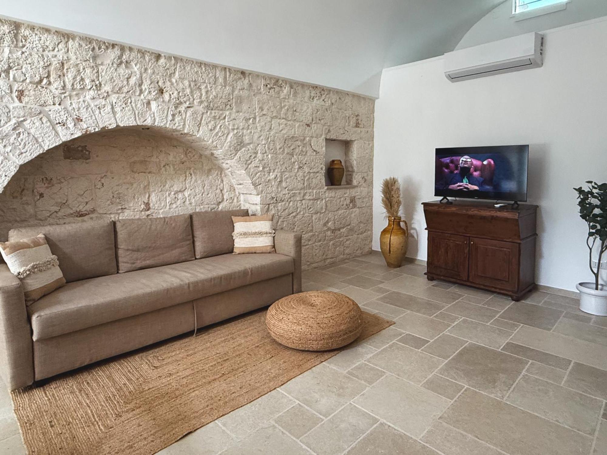 Trullo Pinto Apartment โลโกโรตอนโด ภายนอก รูปภาพ