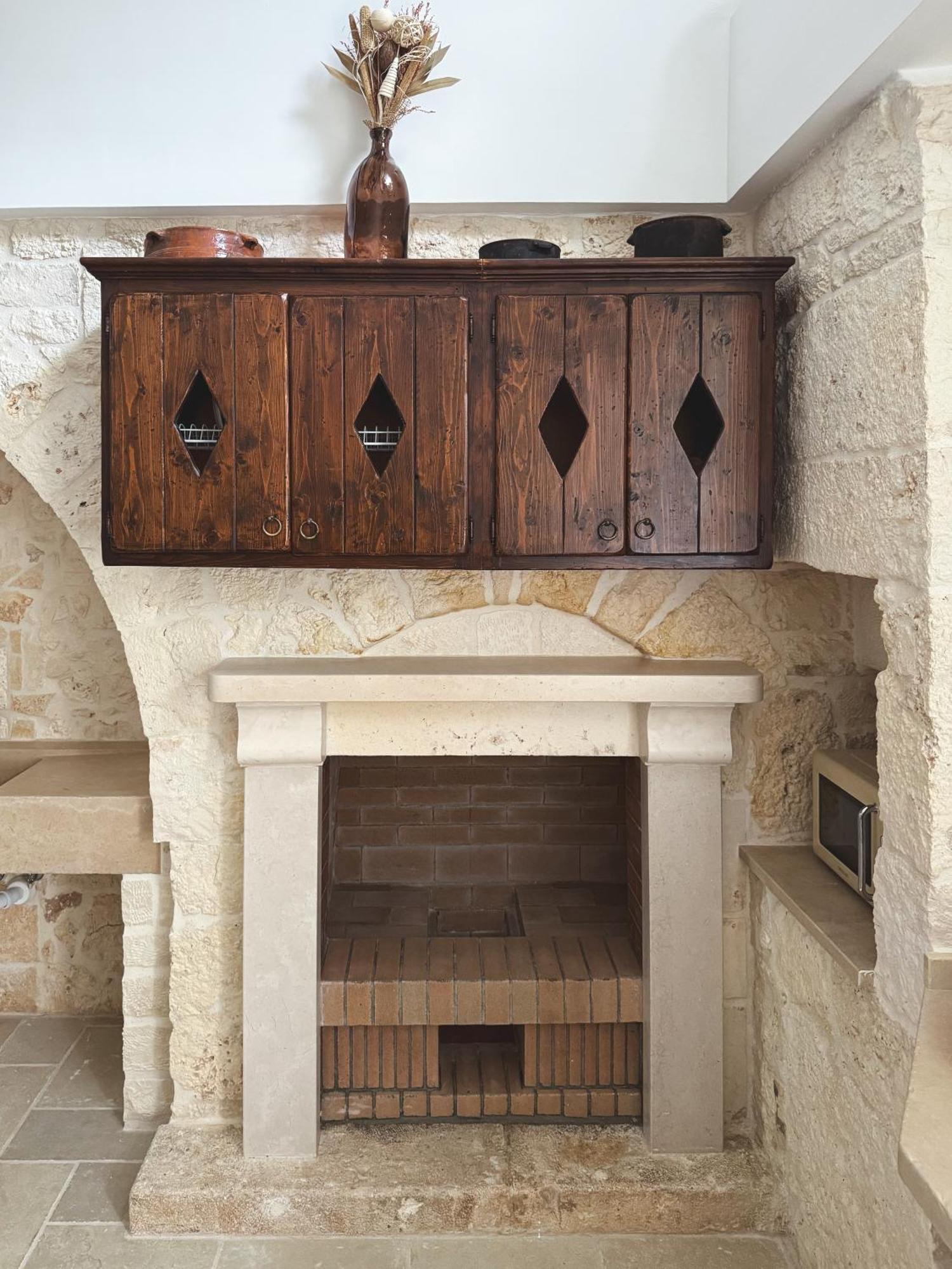 Trullo Pinto Apartment โลโกโรตอนโด ภายนอก รูปภาพ
