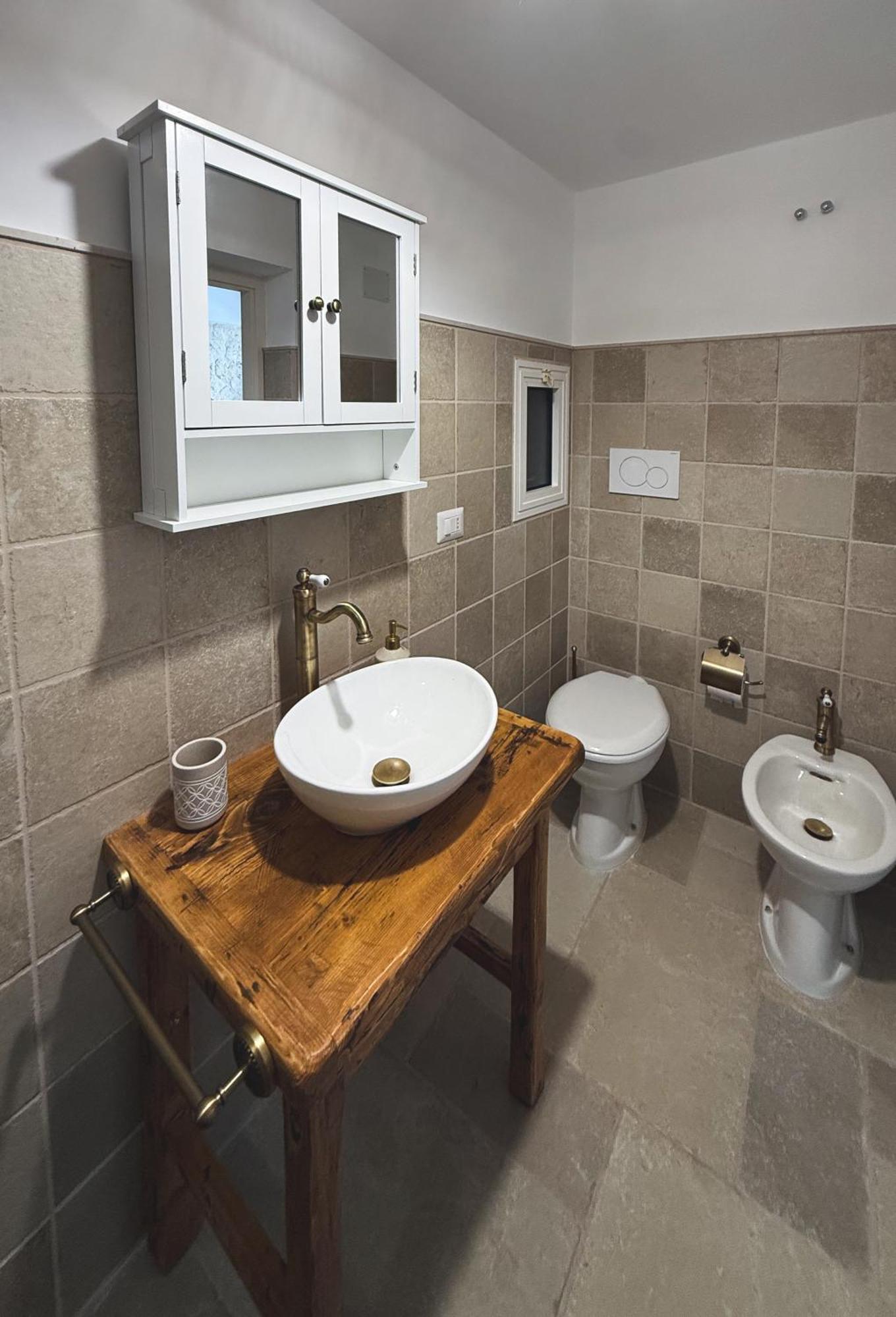 Trullo Pinto Apartment โลโกโรตอนโด ภายนอก รูปภาพ